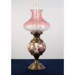 LATE VICTORIAN BRASS TABLE OIL LAMP WITH POTTERY GLOBULAR RESERVOIR, printed with oriental style