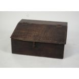 LATE 17th/EARLY 18th CENTURY OAK SLOPE FRONT WRITING BOX with iron butterfly hinged lift-up slope,