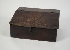 LATE 17th/EARLY 18th CENTURY OAK SLOPE FRONT WRITING BOX with iron butterfly hinged lift-up slope,