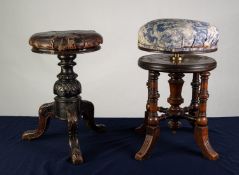 TWO VICTORIAN ADJUSTABLE PIANO STOOLS WITH CIRCULAR SEATS, one in turned walnut, upholstered in blue