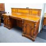 LAMB OF MANCHESTER, IMPRESSIVE CARVED POLLARD OAK SIDEBOARD, NUMBERED 6526, the triple panelled back