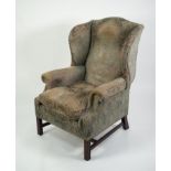 20th CENTURY GEORGE III STYLE WINGED BACK UPHOLSTERED ARMCHAIR with loose cushion seat, covered in