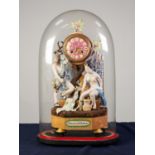 ?DIANA AND ACTOEON? COMPOSITE POTTERY AND WOOD FIGURAL MANTLE CLOCK, the 3? pink porcelain dial with
