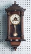 EARLY 20th CENTURY SMALL VIENNA STYLE CARVED AND EBONIZED WOOD WALL CLOCK with Junghans spring