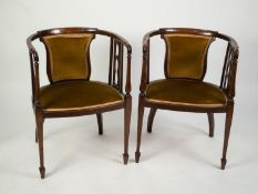 PAIR OF EDWARDIAN INLAID MAHOGANY TUB SHAPED DRAWING ROOM ARMCHAIRS, each with gold velvet back