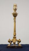 MID 20th CENTURY CLASSICAL DESIGN CAST BRASS TABLE LAMP, with reeded tapering column to a triform