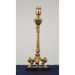 MID 20th CENTURY CLASSICAL DESIGN CAST BRASS TABLE LAMP, with reeded tapering column to a triform