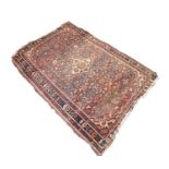 SHIRAZ PERSIAN SEMI-ANTIQUE RUG with diamond shaped white and floral centre medallion with four