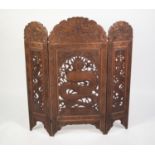 CHINESE CARVED AND PIERCED HARDWOOD LARGE TRIPTYCH GRATE SCREEN, with triple arched top, the