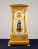 NINETEENTH CENTURY FRENCH ORMOLU PORTICO MANTLE CLOCK, the 4? Roman dial with enamelled chapter ring