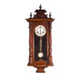 EARLY TWENTIETH CENTURY WALNUT CASED VIENNA WALL CLOCK, the 5? two part Roman dial powered by an