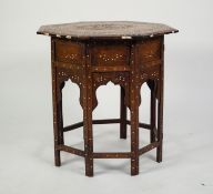 EARLY TWENTIETH CENTURY MIDDLE EASTERN INLAID WALNUT OCCASIONAL TABLE, the octagonal top inlaid with