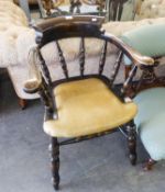 MODERN STAINED BEECH SMOKER?S BOW OR CAPTAIN?S CHAIR, with close studded cream faux leather seat,