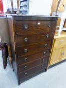 AN OAK TALLBOY CHEST OF SIX DRAWERS