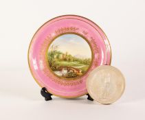 NINETEENTH CENTURY HAND PAINTED CHINA TEAPOT STAND, decorated with a view of ?Haddon Hall,