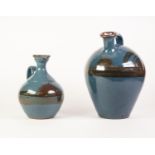 H.A.M.P. TWO BLUE GLAZED STUDIO POTTERY JUG PATTERN VASES, each decorated in lustre with a