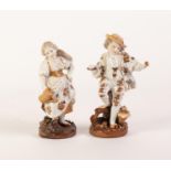 PAIR OF NINETEENTH CENTURY PRESS MOULDED PORCELAIN FIGURES OF A COURTIER AND HIS COMPANION,