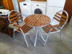 A BISTRO TABLE AND TWO CHAIRS GARDEN SET, CHROME BASES WITH WOODEN TOPS