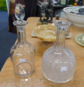TWO NINETEENTH CENTURY CUT GLASS WINE DECANTERS AND ONE STOPPER