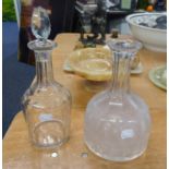 TWO NINETEENTH CENTURY CUT GLASS WINE DECANTERS AND ONE STOPPER