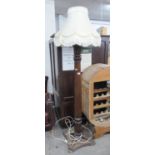 A CARVED MAHOGANY HEAVY STANDARD LAMP WITH TAPERED OCTAGONAL COLUMN AND SQUARE BASE AND THE WHITE