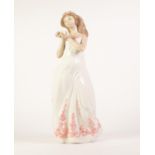 ZAFHIR, SPANISH PORCELAIN LARGE FIGURE OF A BRIDESMAID, holding blossoms in her cupped hands, 16 3/