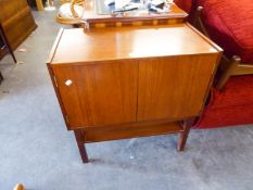 A TEAK RECORD CABINET WITH TWO DOORS