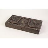 CHINESE CARVED HARDWOOD SHALLOW OBLONG BOX, the hinged lid carved in free relief with a writhing