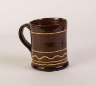 A TWENTIETH CENTURY CLAYPITS POTTERY, EWENNY, BRIDGEND, WALES, BROWN GLAZED, CREAM SLIP DECORATED