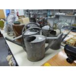 FOUR VINTAGE GALVANIZED WATERING CANS (4)