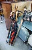 FIVE UMBRELLAS, 4 WOODEN WALKING STICKS, A SHOOTING STICK AND TWO METAL ADJUSTABLE WALKING STICKS