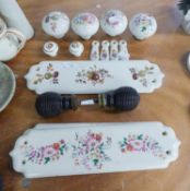 THIRTEEN PIECES OF WHITE AND FLORAL CERAMIC DOOR FURNITURE, COMPRISING 4 DOORKNOBS, 5 FINGER