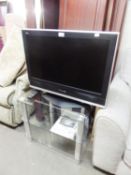 PANASONIC VIERA FLAT SCREEN TELEVISION, ON GLASS THREE TIER STAND