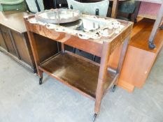 AN OAK TEA TROLLEY