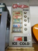 A PAINTED WOODEN FAUX CANNED DRINK DISPENSING CABINET