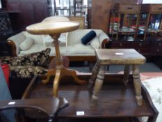 A SMALL OAK OBLONG MILKING STOOL, ON FOUR TURNED LEGS AND A MAHOGANY TRIPOD WINE TABLE (2)