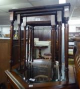 A NEST OF THREE MAHOGANY COFFEE TABLES, WITH GREEN LEATHER INLET TOPS