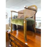 ART DECO WALNUTWOOD ARMCHAIR HAVING SHAPED CANE BACK AND UPHOLSTERED SEAT