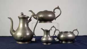 VICTORIAN FOUR PIECE BRITANNIA METAL TEA AND COFFEE SET BY JAMES DIXON, circular, with scroll