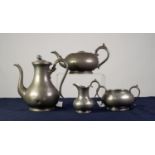 VICTORIAN FOUR PIECE BRITANNIA METAL TEA AND COFFEE SET BY JAMES DIXON, circular, with scroll