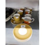 FIVE SUSIE COOPER 'NEBULA' PATTERN CHINA COFFEE CANS AND SAUCERS, CREAM JUG AND A SUGAR BASIN