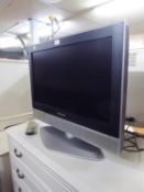 A PANASONIC 26" COLOUR TELEVISION,