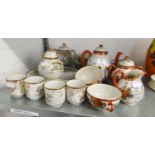 JAPANESE EGGSHELL CHINA COFFEE SET FORMERLY FOR SIX PERSONS, PAINTED DECORATION OF BIRDS IN A