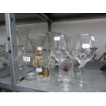 A STUDIO GLASS BALUSTER VASE, DRINKING GLASSES AND OTHER GLASS WARE