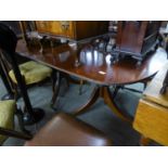 A MAHOGANY REGENCY STYLE ?D? END DOUBLE PEDESTAL DINING TABLE WITH ONE LOOSE LEAF