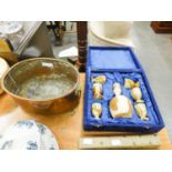 AFRICAN CARVED ONYX LIQUEUR SET OF A DECANTER AND SIX SMALL STEM CUPS, IN BLUE VELVET FITTED CASE