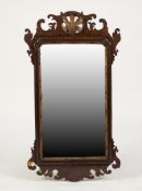 EARLY 20th CENTURY GEORGIAN REVIVAL WALNUT AND PARCEL GILT VERTICAL WALL MIRROR, the plate within
