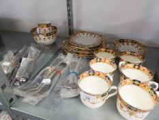 A GLADSTONE CHINA PART TEA SET FOR SIX PERSONS AND A STAINLESS STEEL SERVICE FOR SIX PERSONS