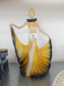 WADE STYLE ART DECO POTTERY FIGURE OF A DANCING GIRL, HOLDING OUT THE HEM OF HER DRESS