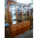 A LARGE CHERRY-WOOD DISPLAY CABINET, THE UPPER SECTION HAVING FOUR GLAZED DOORS, THE LOWER SECTION